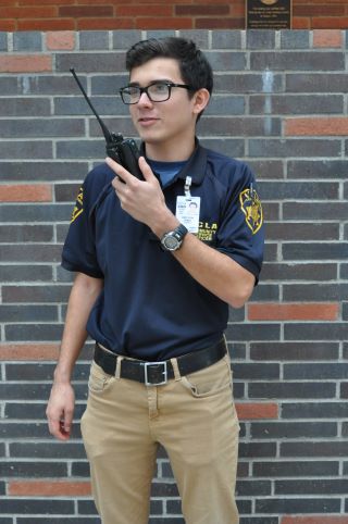 CSO officer using his two-way radio