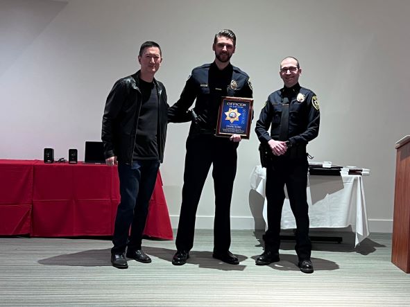 Officer Frank Bobo with the Officer of the Year Award